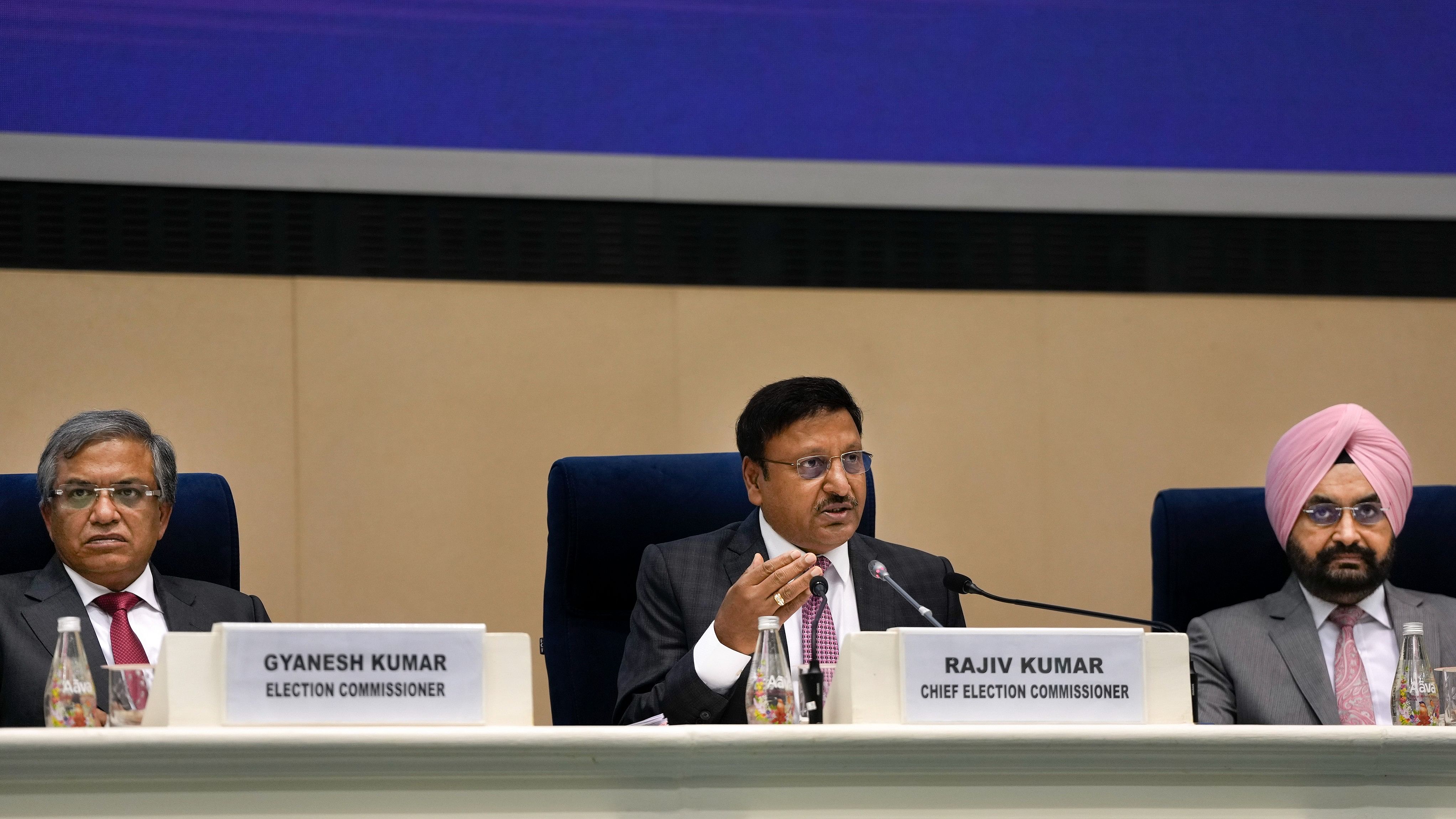 <div class="paragraphs"><p>Chief Election Commissioner Rajiv Kumar with election commissioners Gyanesh Kumar and Sukhbir Singh Sandhu during a press conference to announce the schedule for 'General Election to Legislative Assemblies 2024', in New Delhi, Friday.</p></div>